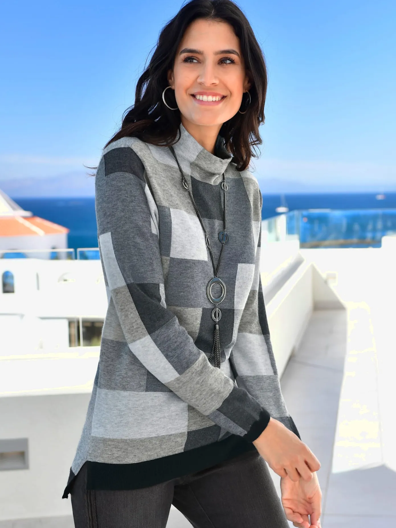 Pulls<Pull femme à carreaux intarsia col montant