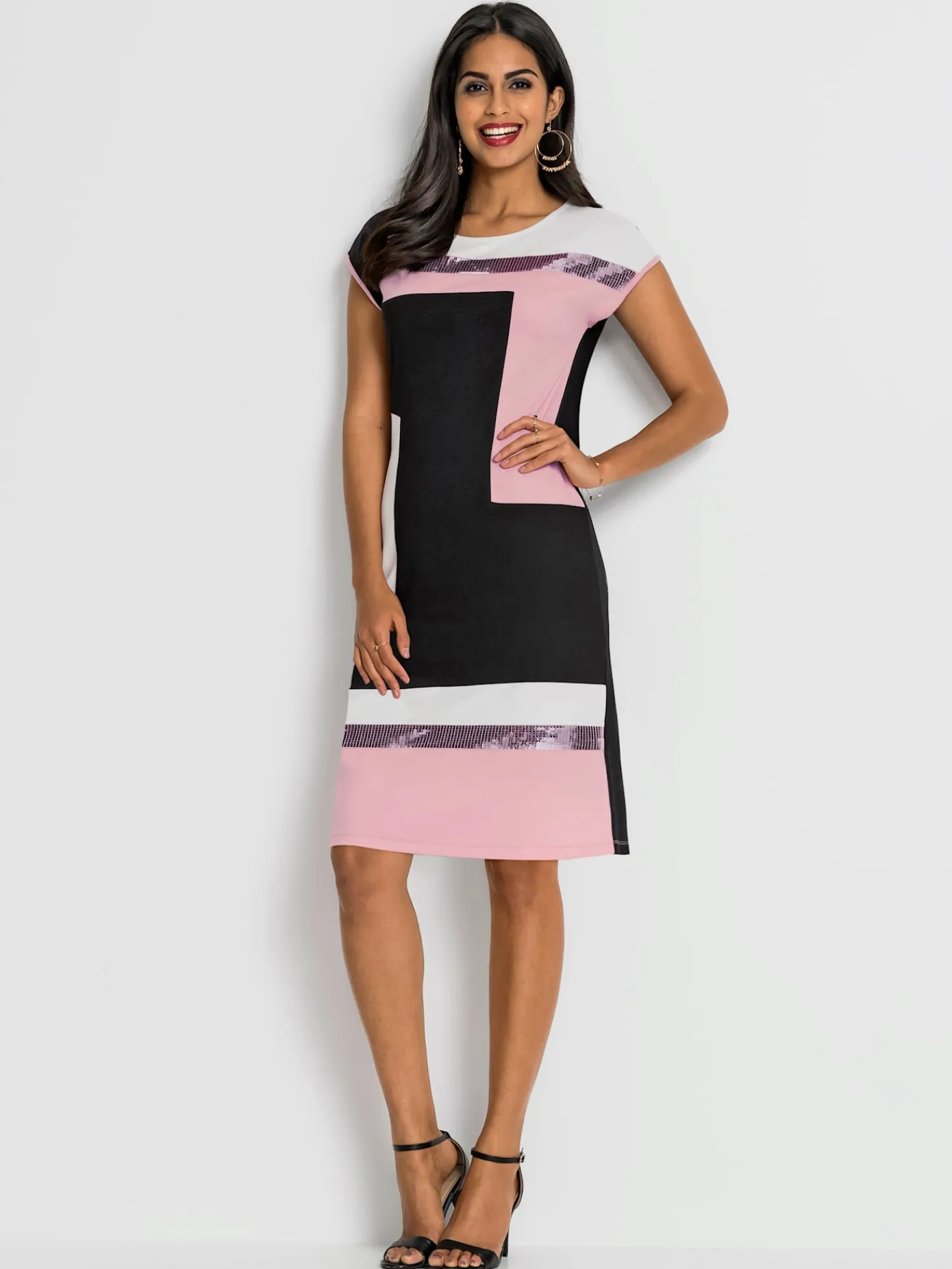 Robes<Robe en jersey orné de paillettes brillantes