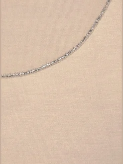 LASCANA T-Shirts<T-shirt à col rond finitions pailletées raffinées à l'encolure ronde et à l'ourlet